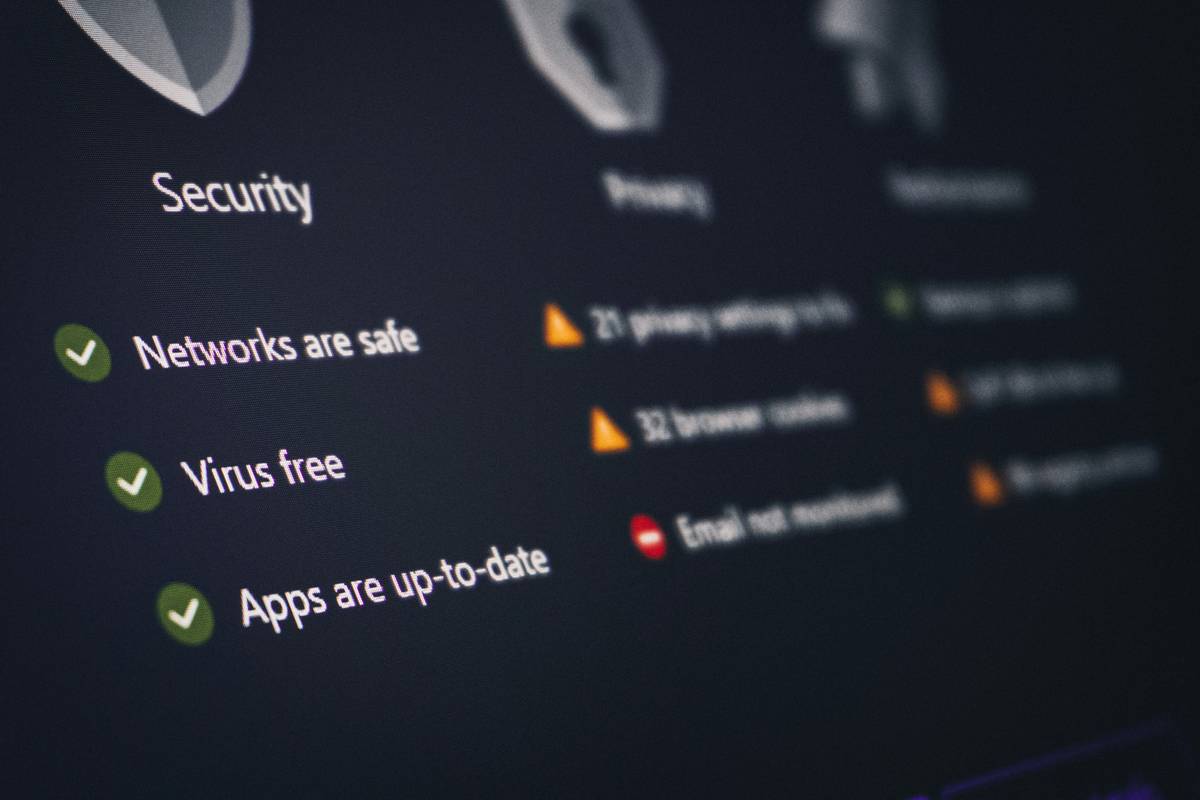 servers and data security: illustration of locked server rack with shield icon protecting student data icons